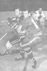 Keon and Pilote chasing the puck