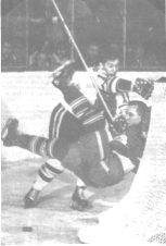 Ron Ellis is decked by Maki