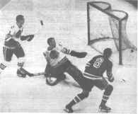 Action around Hawks' net