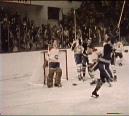 Pulford raises his stick to indicate winning goal