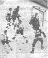 Action around Hawks' net